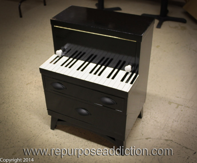 Piano themed vintage nightstand